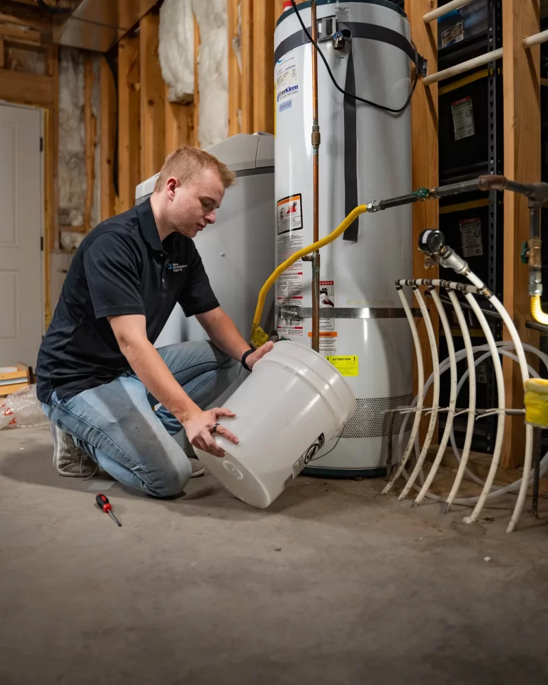 Home Maintenance Experts Tech Draining Water Heater